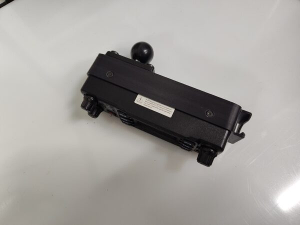 Profile of radio faceplate with integrated mic holder